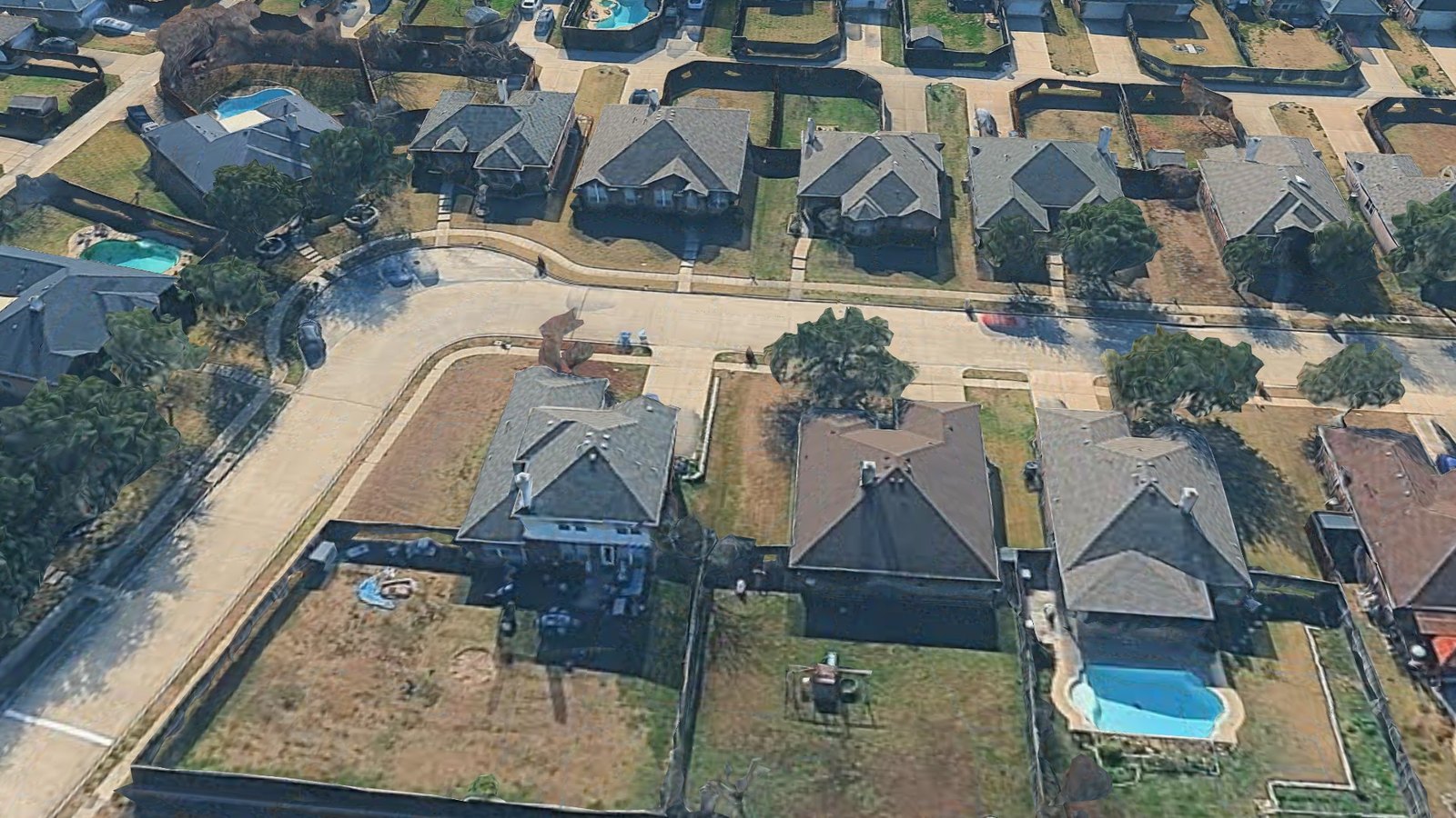 Photorealistic 3D render of the same house from Google's 3D tiles, framed by a Cesium camera that computed its own heading